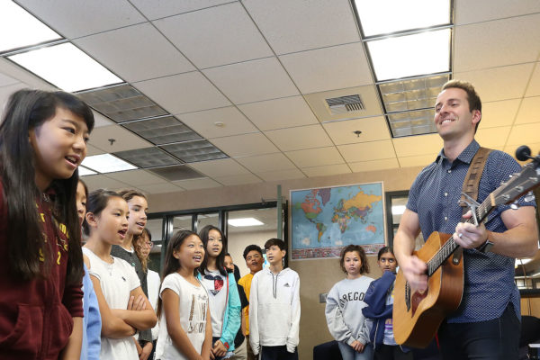 Guitar-playing teacher sparks creativity