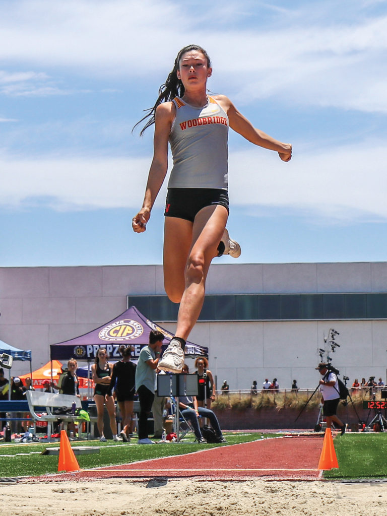 Woodbridge High School track and field star Maddie Lyon soars in the long jump. She was named the 2020 Pacific Coast League Female Athlete of the Year.