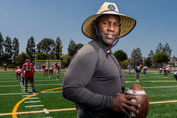 Former NFL star leads Woodbridge football