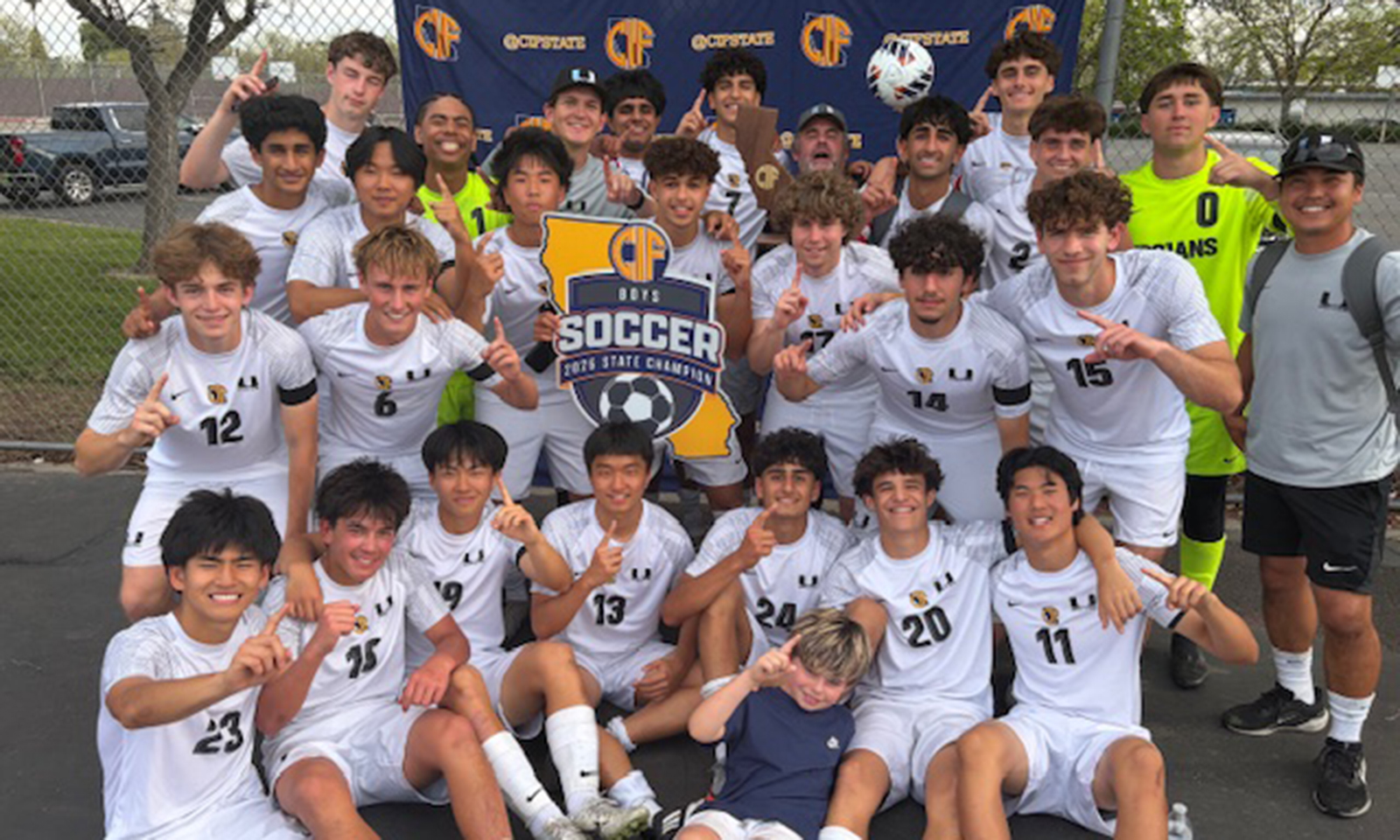 University boys soccer captures state title